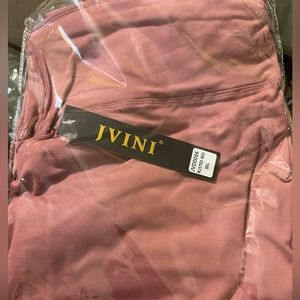 Woman’s Jvini plus size 3XL Rusted Red Leggings new in plastic bag